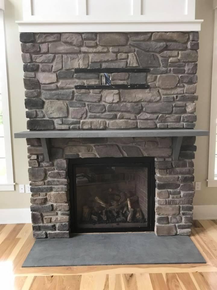 Custom stone fireplace at Harvey’s lake