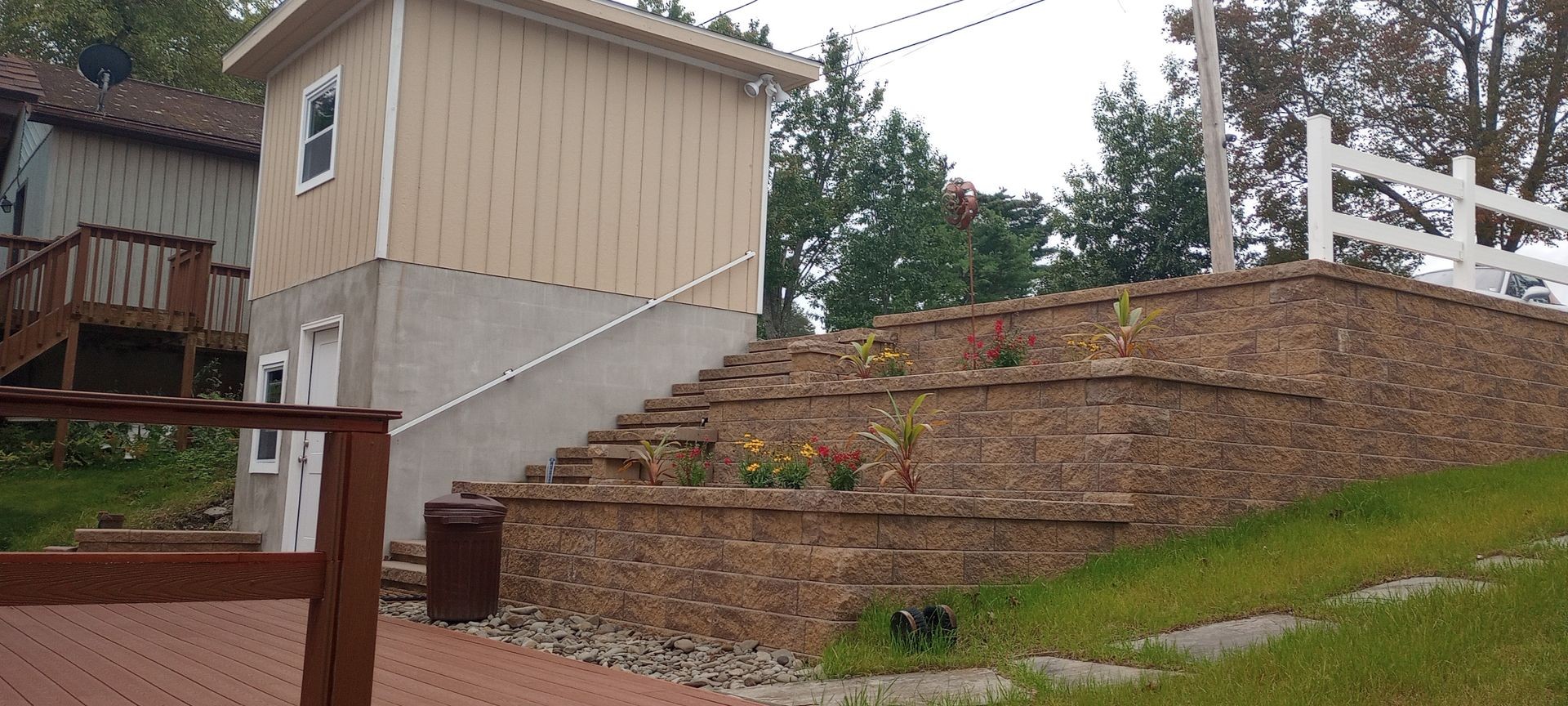 Versa Lok Retaining Walls, Custom built shed, Composite deck, Exterior Renovation